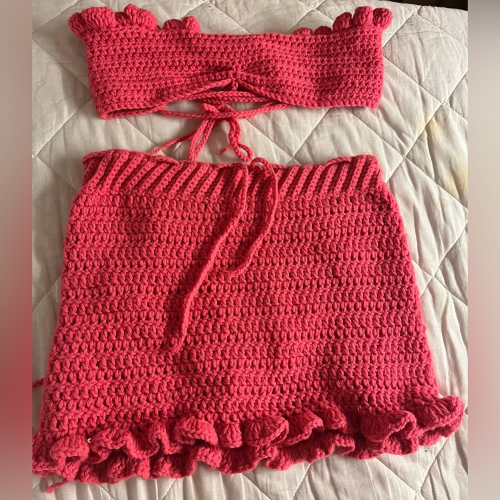 Custom made two piece never worn-bought from local it’s a mini skirt and bandeau